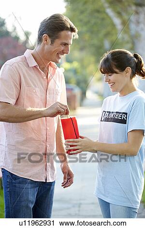 Charity Worker Collecting From Man In Street View Large Photo Image Stock Image - Charity Worker Collecting From Man In Street. Fotosearch