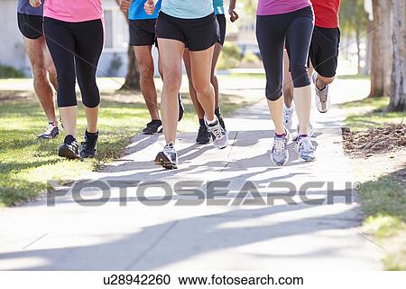 Close Up Of Runners Feet On Suburban Street View Large Photo Image Stock Image - Close Up Of Runners Feet On Suburban Street. Fotosearch
