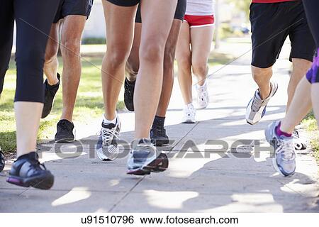 Close Up Of Runners Feet On Suburban Street View Large Photo Image Stock Photograph - Close Up Of Runners Feet On Suburban Street. Fotosearch
