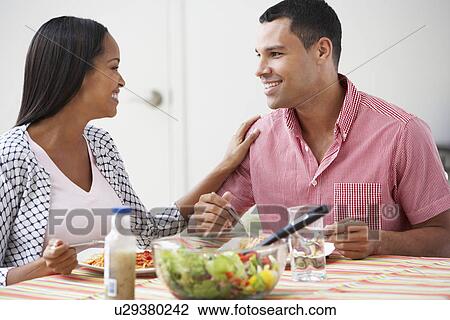 Couple Eating Meal Together At Home View Large Photo Image Stock Image - Couple Eating Meal Together At Home. Fotosearch