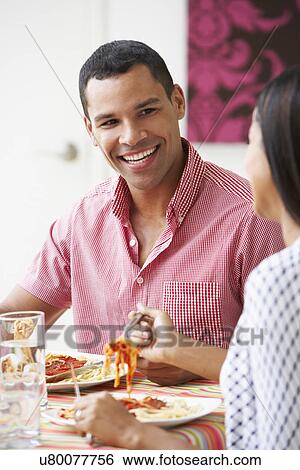 Couple Eating Meal Together At Home View Large Photo Image Stock Photograph - Couple Eating Meal Together At Home. Fotosearch