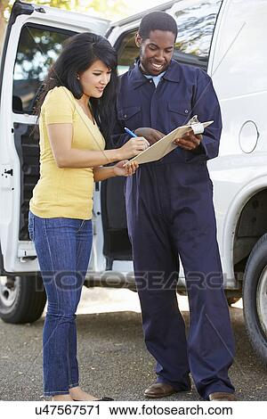 Customer Signing For Delivery From Courier View Large Photo Image Stock Image - Customer Signing For Delivery From Courier. Fotosearch