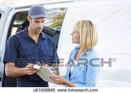 Customer Signing For Delivery From Courier View Large Photo Image Stock Image - Customer Signing For Delivery From Courier. Fotosearch