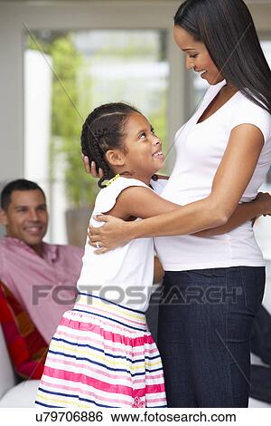 Daughter Hugging Pregnant Mother View Large Photo Image Stock Photograph - Daughter Hugging Pregnant Mother. Fotosearch