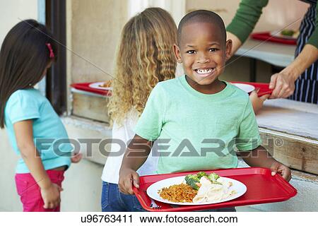 Elementary Pupils Collecting Healthy Lunch In Cafeteria View Large Photo Image Stock Image - Elementary Pupils Collecting Healthy Lunch In Cafeteria. Fotosearch