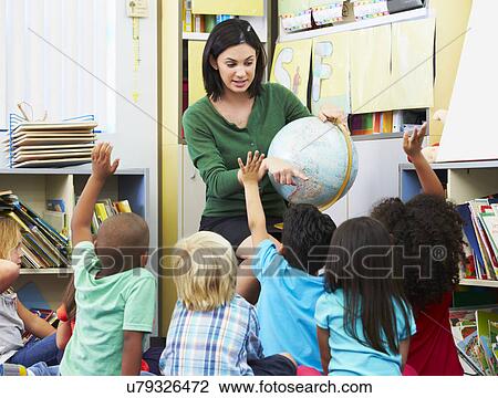 Elementary Pupils In Geography Class With Teacher View Large Photo Image Stock Image - Elementary Pupils In Geography Class With Teacher. Fotosearch