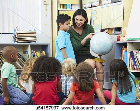 Elementary Pupils In Geography Class With Teacher View Large Photo Image Stock Photo - Elementary Pupils In Geography Class With Teacher. Fotosearch