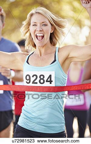 Female Runner Winning Marathon View Large Photo Image Stock Image - Female Runner Winning Marathon. Fotosearch