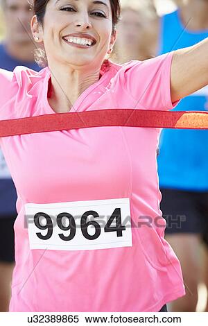 Female Runner Winning Marathon View Large Photo Image Stock Photography - Female Runner Winning Marathon. Fotosearch