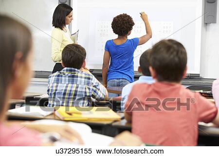 Female Student Writing Answer On Whiteboard View Large Photo Image Stock Photography - Female Student Writing Answer On Whiteboard. Fotosearch