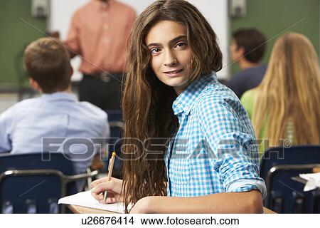 Female Teenage Pupil In Classroom View Large Photo Image Picture - Female Teenage Pupil In Classroom. Fotosearch
