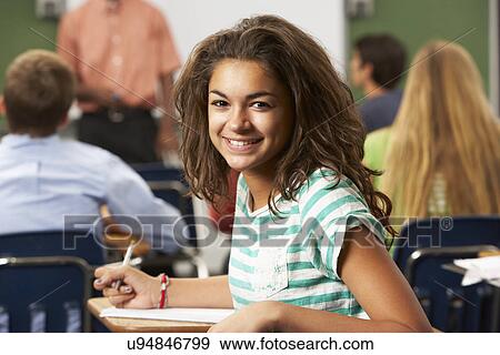 Female Teenage Pupil In Classroom View Large Photo Image Stock Photo - Female Teenage Pupil In Classroom. Fotosearch
