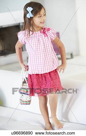 Girl Jumping On Sofa View Large Photo Image Stock Image - Girl Jumping On Sofa. Fotosearch