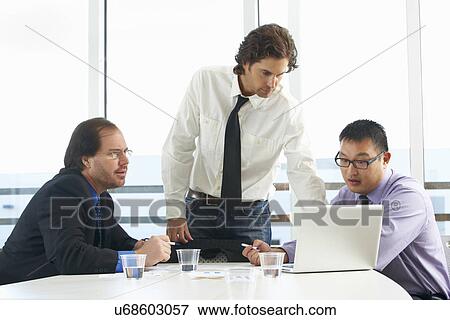 Group Of Businessmen Meeting In Office View Large Photo Image Stock Photo - Group Of Businessmen Meeting In Office. Fotosearch