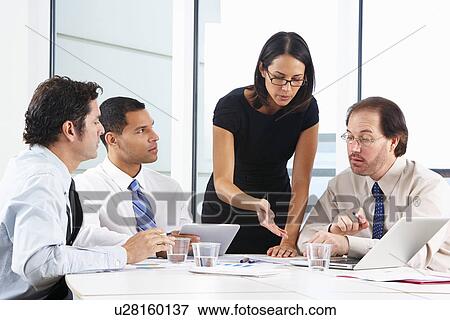 Group Of Businesspeople Meeting In Office View Large Photo Image Stock Photo - Group Of Businesspeople Meeting In Office. Fotosearch