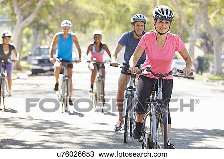 Group Of Cyclists On Suburban Street View Large Photo Image Stock Image - Group Of Cyclists On Suburban Street. Fotosearch