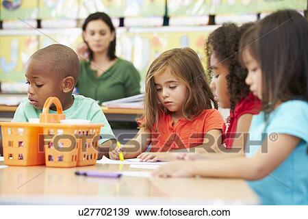 Group Of Elementary Age Children In Art Class With Teacher View Large Photo Image Stock Photo - Group Of Elementary Age Children In Art Class With Teacher. Fotosearch
