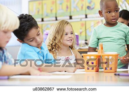 Group Of Elementary Age Children In Art Class With Teacher View Large Photo Image Stock Photo - Group Of Elementary Age Children In Art Class With Teacher. Fotosearch