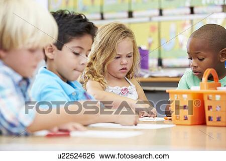 Stock Photograph - Group Of Elementary Age Children In Art Class. Fotosearch