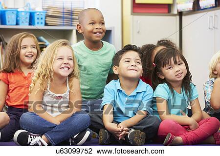 Group of Elementary Pupils In Classroom View Large Photo Image Stock Image - Group of Elementary Pupils In Classroom. Fotosearch