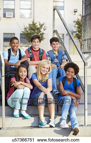 Stock Image - Group of Elementary Pupils Outside Classroom . Fotosearch