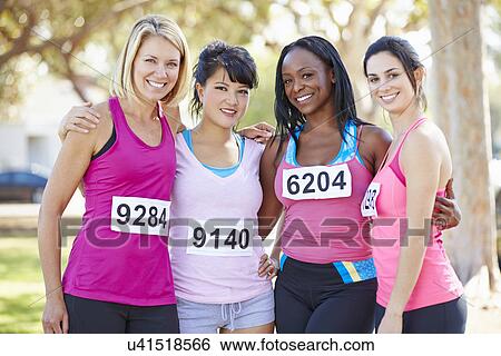 Stock Photograph - Group Of Female Runners Before Race. Fotosearch