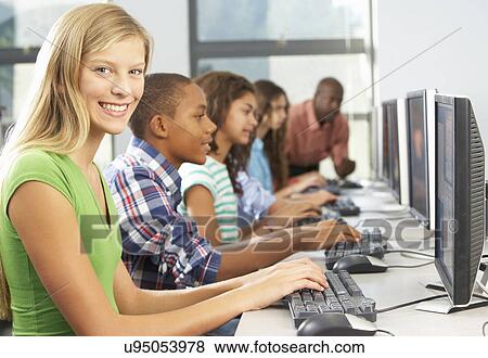 Group Of Students Working At Computers In Classroom View Large Photo Image Stock Photo - Group Of Students Working At Computers In Classroom. Fotosearch
