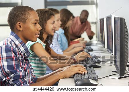 Group Of Students Working At Computers In Classroom View Large Photo Image Stock Photograph - Group Of Students Working At Computers In Classroom. Fotosearch