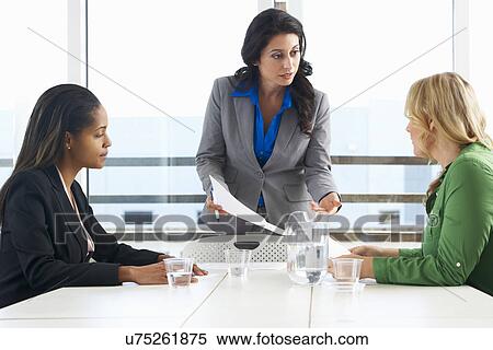 Stock Photography - Group Of Women Meeting In Office. Fotosearch