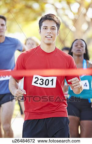 Male Runner Winning Marathon View Large Photo Image Stock Image - Male Runner Winning Marathon. Fotosearch