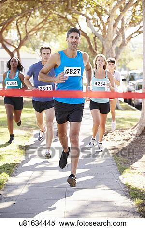 Male Runner Winning Marathon View Large Photo Image Stock Photography - Male Runner Winning Marathon. Fotosearch