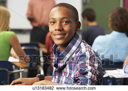 Male Teenage Pupil In Classroom View Large Photo Image Stock Image - Male Teenage Pupil In Classroom. Fotosearch
