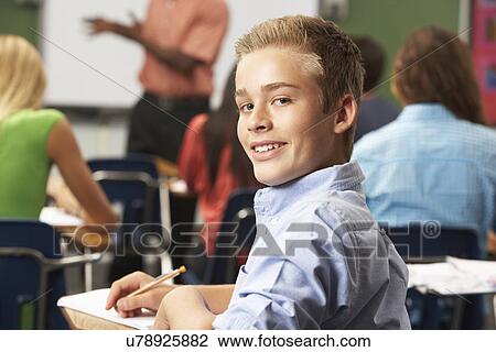 Male Teenage Pupil In Classroom View Large Photo Image Stock Image - Male Teenage Pupil In Classroom. Fotosearch