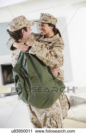 Military Couple Greeting Each Other On Home Leave View Large Photo Image Stock Image - Military Couple Greeting Each Other On Home Leave. Fotosearch