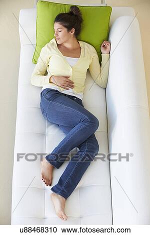 Overhead View Of Woman Relaxing On Sofa View Large Photo Image Stock Image - Overhead View Of Woman Relaxing On Sofa. Fotosearch