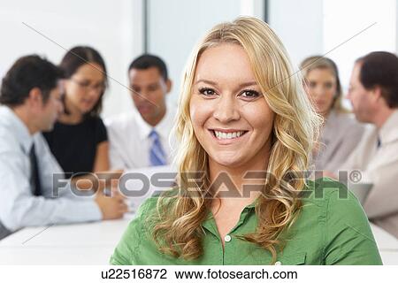 Portrait Of Businesswoman Sitting At Boardroom Table View Large Photo Image Stock Image - Portrait Of Businesswoman Sitting At Boardroom Table. Fotosearch