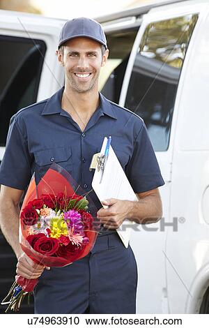 Portrait Of Delivery Driver With Flowers View Large Photo Image Stock Image - Portrait Of Delivery Driver With Flowers. Fotosearch