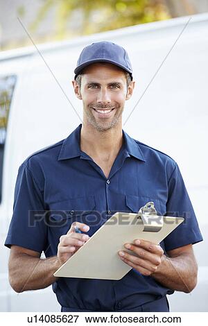 Portrait Of Delivery Driver With Clipboard View Large Photo Image Stock Photo - Portrait Of Delivery Driver With Clipboard. Fotosearch