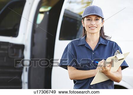 Portrait Of Female Delivery Driver With Clipboard View Large Photo Image Stock Photo - Portrait Of Female Delivery Driver With Clipboard. Fotosearch
