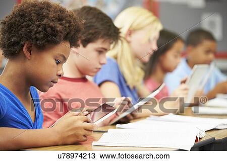 Pupils In Class Using Digital Tablet View Large Photo Image Stock Image - Pupils In Class Using Digital Tablet. Fotosearch