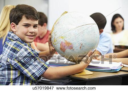 Pupils Studying Geography In Classroom View Large Photo Image Stock Photo - Pupils Studying Geography In Classroom. Fotosearch