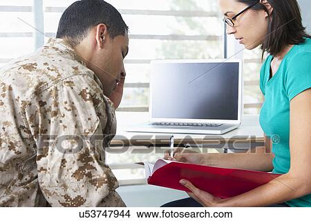 Picture - Soldier Having Counselling Session. Fotosearch