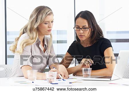 Two Businesswomen Meeting In Office View Large Photo Image Stock Image - Two Businesswomen Meeting In Office. Fotosearch