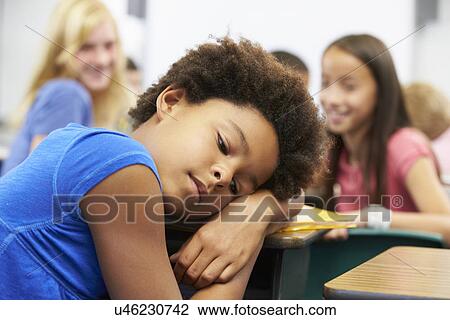 Unhappy Girl Being Bullied In Class View Large Photo Image Stock Image - Unhappy Girl Being Bullied In Class. Fotosearch
