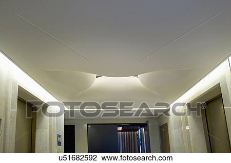 Abstract recessed light in elevator hallway View Large Photo Image Stock Image - Abstract recessed light in elevator hallway. Fotosearch