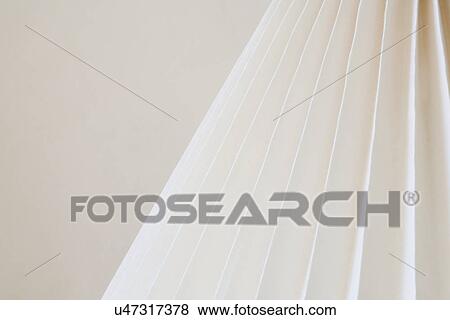 Accordion lampshade against white wall; Montecito; California; USA View Large Photo Image Stock Photo - Accordion lampshade against white wall; Montecito; California; USA. Fotosearch