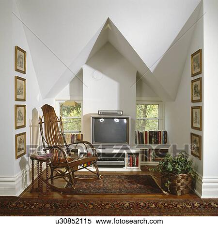 Antique rocking chair and television in nook of traditional house View Large Photo Image Stock Photography - Antique rocking chair and television in nook of traditional house. Fotosearch
