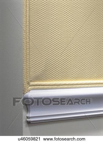 Stock Image - Architectural detail of beige textured wall. Fotosearch