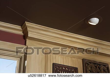 Architectural Trim Dark Brown Painted Ceiling Red Walls Light Stained Trim Stock Photo