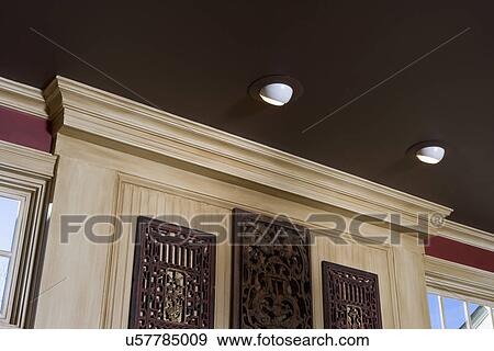 Architectural Trim Dark Brown Painted Ceiling Light Stained Wood Trim Red Walls Stock Photo